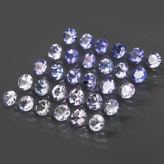 Glittering 5.11ct bright blue violet Tanzanite set