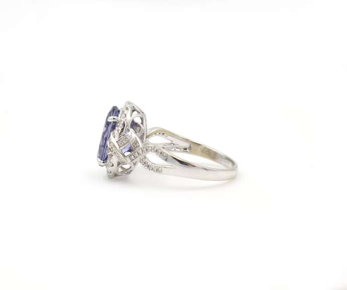 6.40ctw Tanzanite and Diamond Halo Ring