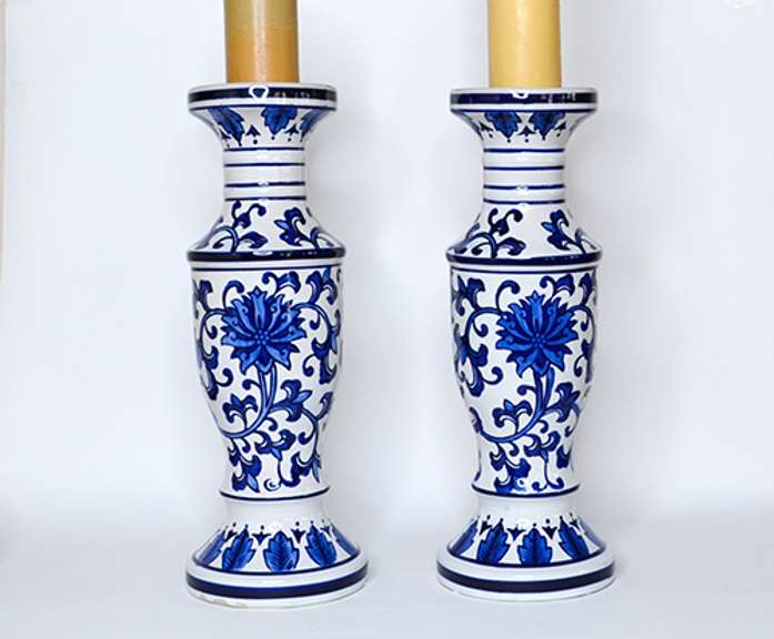 Two Large Cobalt Blue and White Chinoiserie Ceramic Candle Holders With Floral Design