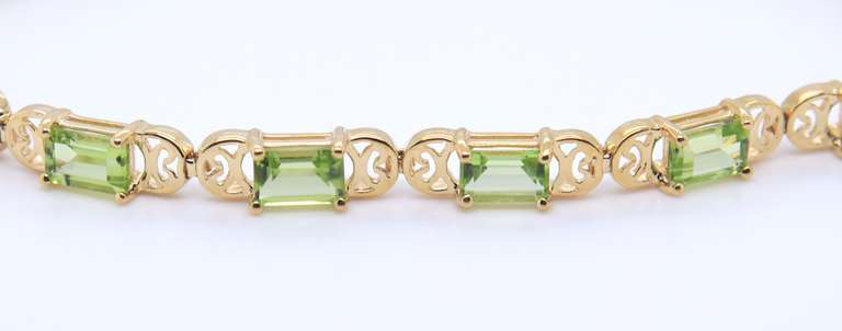 Gorgeous Yellow Gold Peridot Line Bracelet