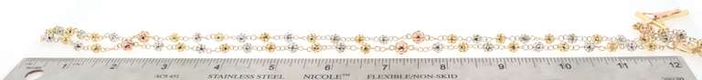 Attractive 14kt gold beaded rosary with cross pendant