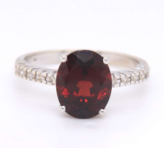 Dazzling White Gold Diamond and Oval Garnet Ring