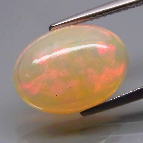 Glowing! 3.85ct full rainbow mixed patterned Jelly Opal