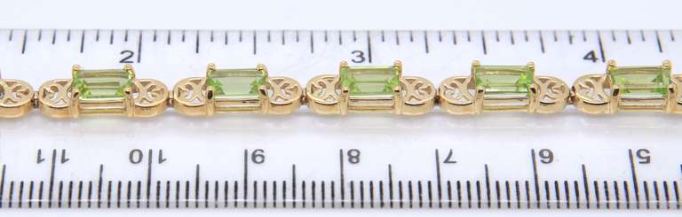 Gorgeous Yellow Gold Peridot Line Bracelet