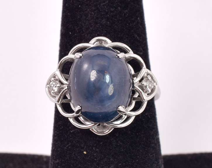 Sensational 11.11CTS Cabochon-Cut Star Sapphire & 0.08CTW Diamond Ring in Sterling Silver