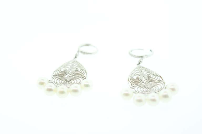 6MM CULTURED PEARL AND DIAMOND CHANDELIER EARRINGS.