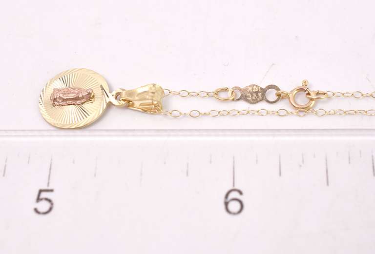 Ravishing Religious Pendant in 14K Yellow Gold