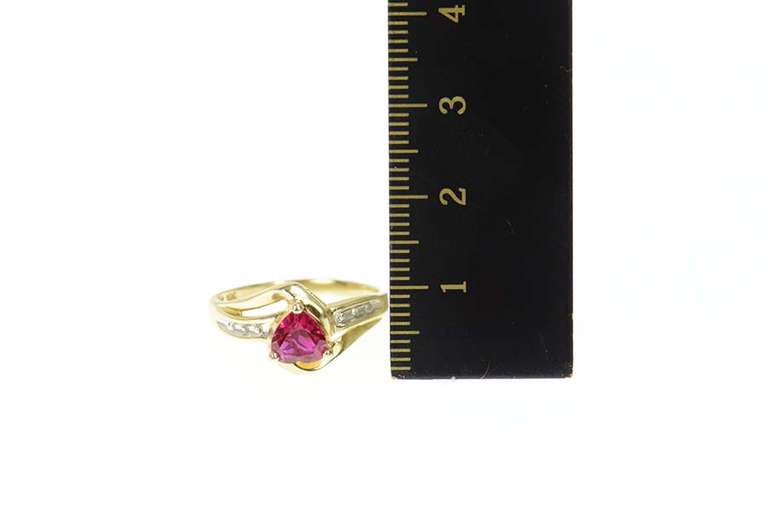 10K Yellow Gold Heart Sim. Ruby Diamond Accent Bypass Ring