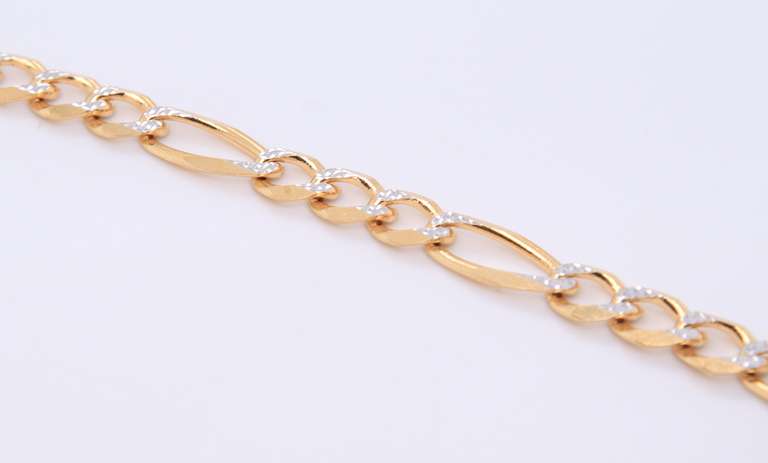 Exceptional Yellow Gold Diamond Cut Figaro Bracelet