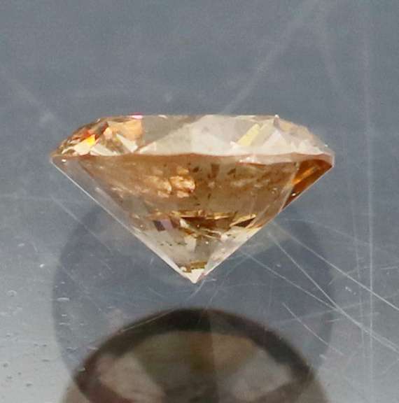 Eye catching 0.26ct smooth cut Chocolate Diamond solitaire