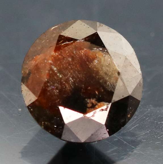 Glistening .91ct black calico Diamond solitaire