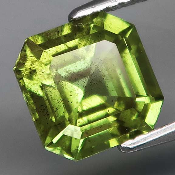 Stunning 2.77ct emerald cut apple green Peridot