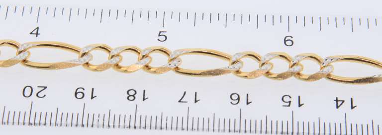 Exceptional Yellow Gold Diamond Cut Figaro Bracelet