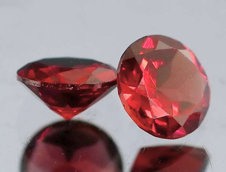 Vibrant open color 1.20ct pair of Rhodolite Garnets