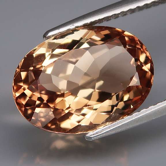 Glittering 7.52ct bright orange amber Imperial Topaz
