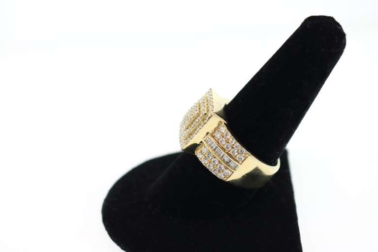 Regal 14k Yellow Gold Ring with Stepped Diamonds and Flanked by Baguette Diamonds