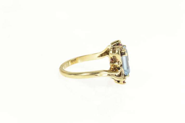 10K Yellow Gold Emerald Cut Blue Topaz Synthetic Ruby Bypass Ring