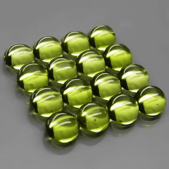 Pristine 10.69ct 16pc lime green Peridot set
