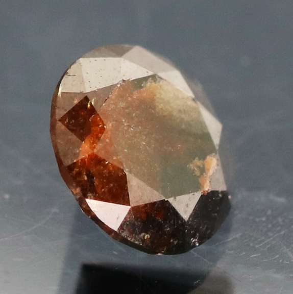 Glistening .91ct black calico Diamond solitaire