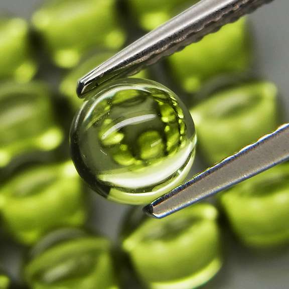 Pristine 10.69ct 16pc lime green Peridot set