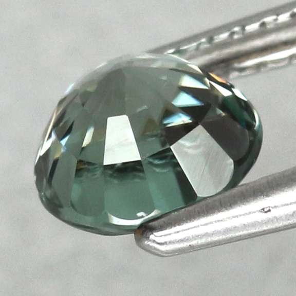 Super glittering! 1.39ct blue green Cambodian Zircon