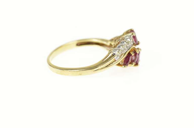 10K Yellow Gold Marquise Ruby Diamond Accent Wavy Bypass Ring
