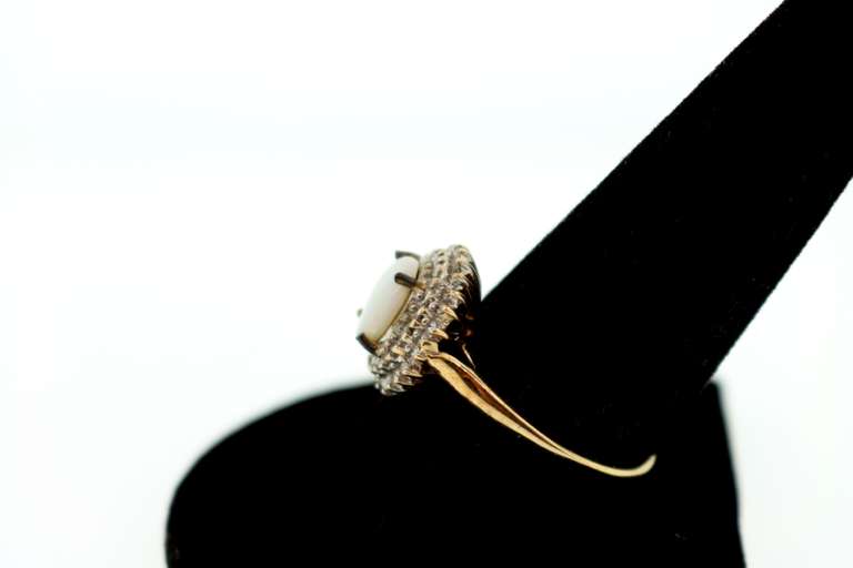 LADIES GOLD DIAMOND AND OPAL RING