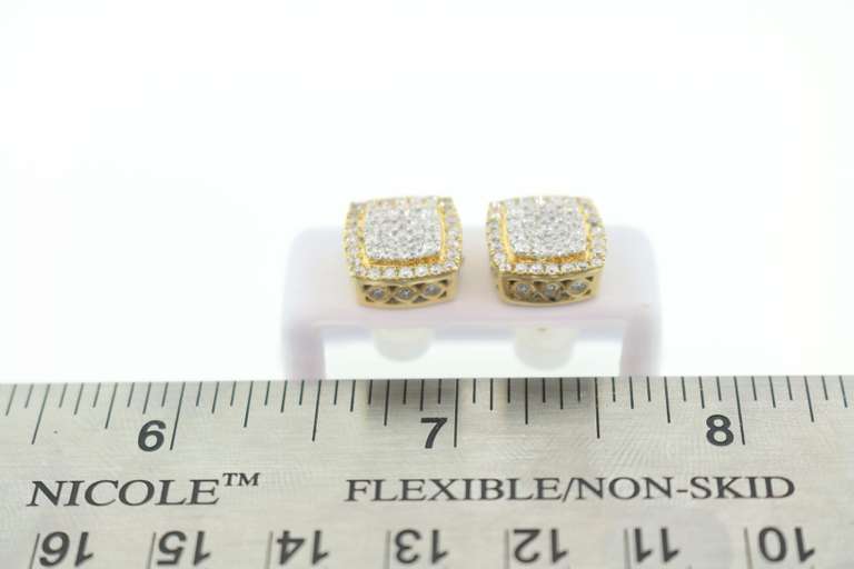 Sparkling Diamond Cluster Earrings with 14k Yellow Gold edged with triple set Diamonds