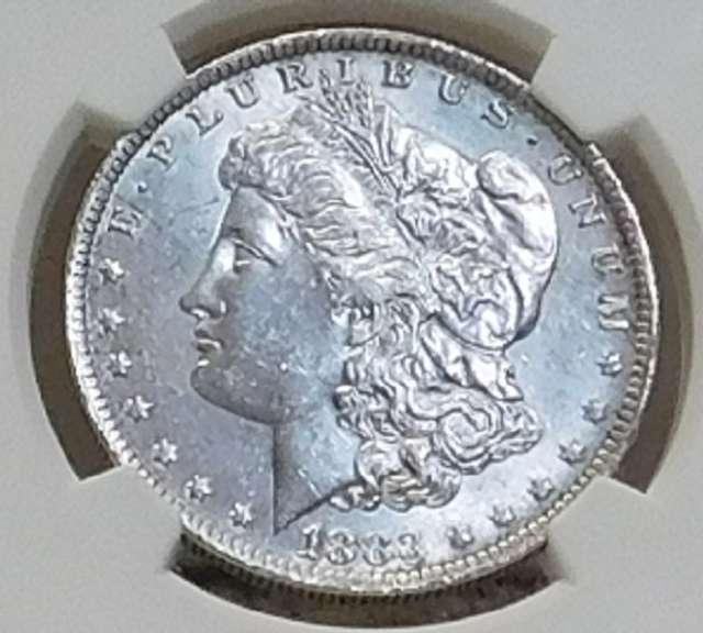 1883-O Morgan Dol NGC  Unc Clnd