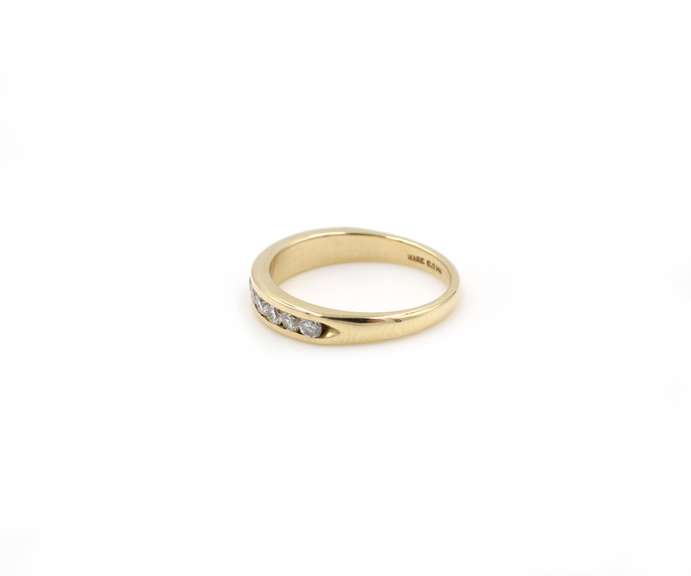 Elegant Yellow Gold Channel Diamond Band