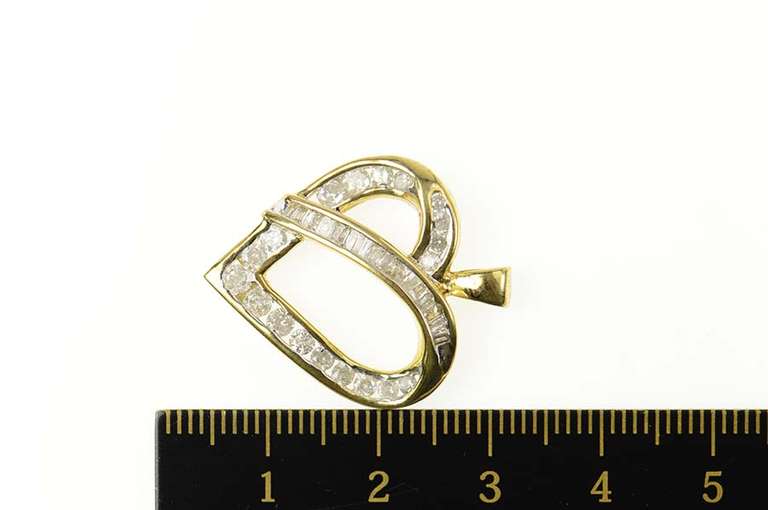10K Yellow Gold 1.00 Ctw Baguette & Round Diamond Heart Pendant
