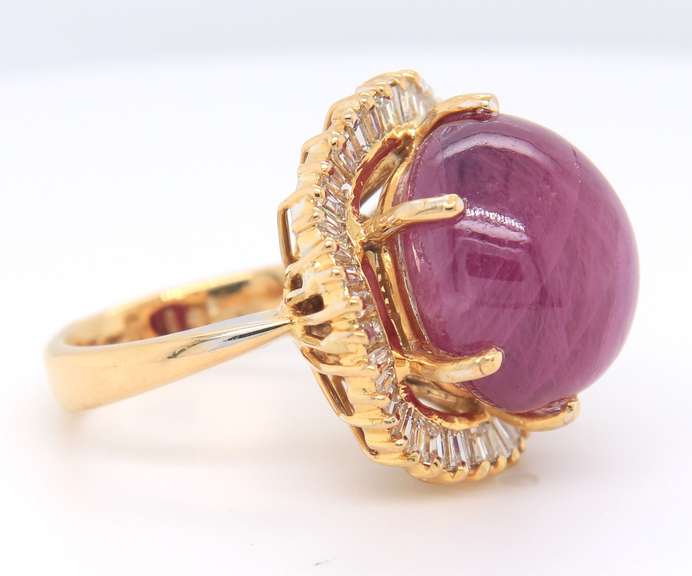 Opulent 14kt YG Cabochon Ruby with Wavy Baguette Halo Ring