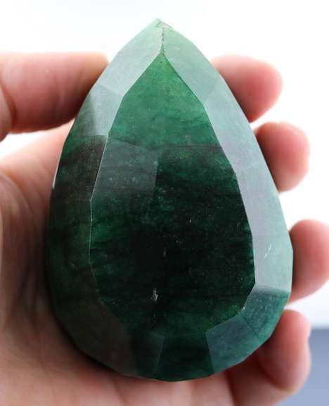 Huge .372kg (1860ct) pear cut forest green Emerald