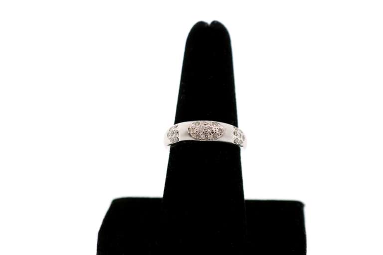 LADIES 18K WHITE GOLD DIAMOND BAND SATIN FINISH.