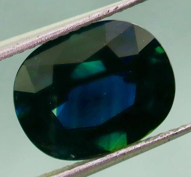 Heated only! 3.84ct midnight blue-green Sapphire