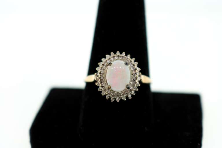 LADIES GOLD DIAMOND AND OPAL RING
