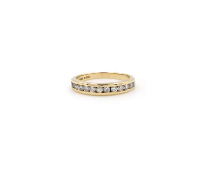 Elegant Yellow Gold Channel Diamond Band