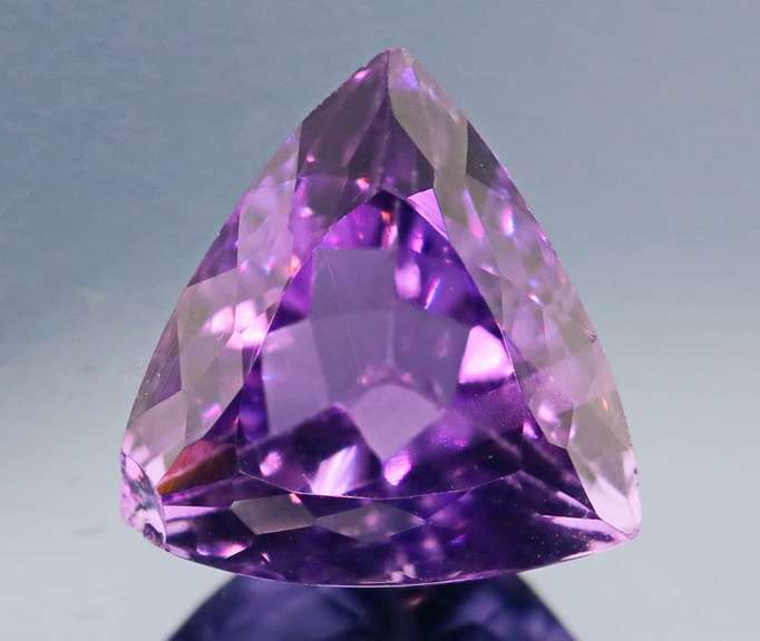 Glittering 7.83ct trillion cut Bolivian Amethyst