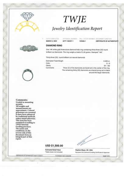 0.40ct Diamond Three Stone Halo Ring in 14K