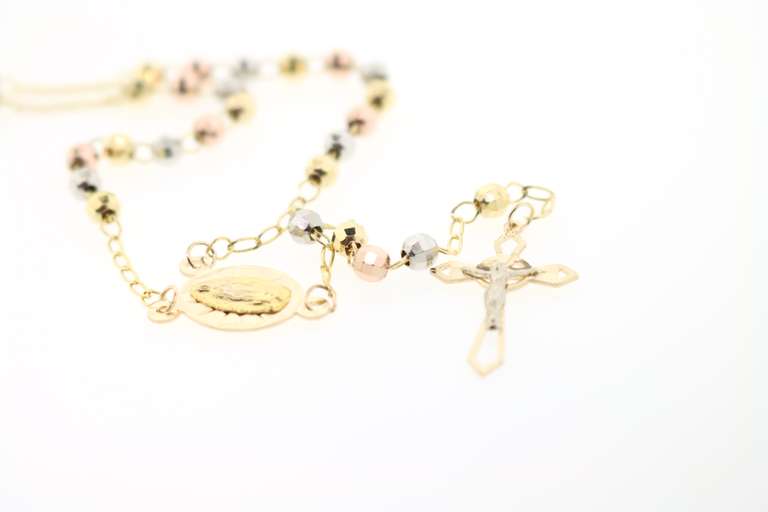 Beauteous 14kt gold beaded necklace with cross pendant