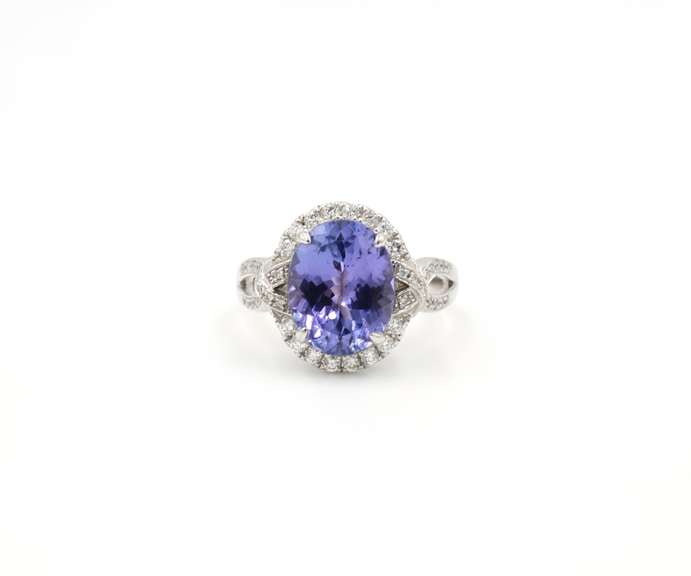 6.40ctw Tanzanite and Diamond Halo Ring