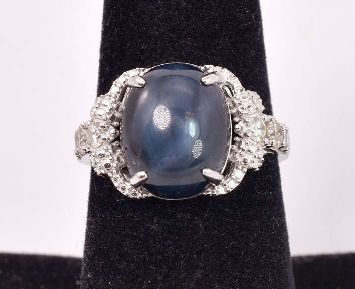 Stunning 8.83CTS Star Sapphire and 0.40CTW Diamond Sterling Silver Ring