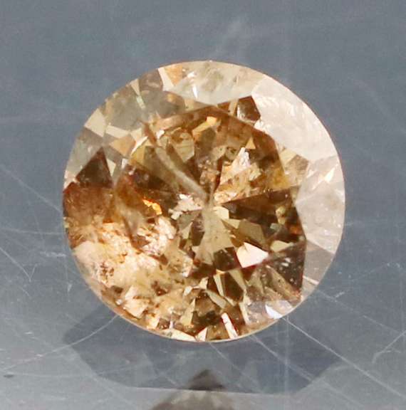 Eye catching 0.26ct smooth cut Chocolate Diamond solitaire