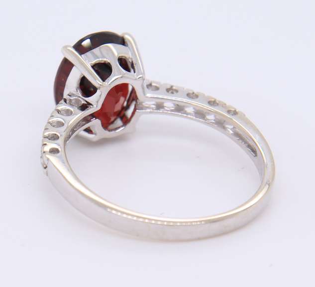Dazzling White Gold Diamond and Oval Garnet Ring
