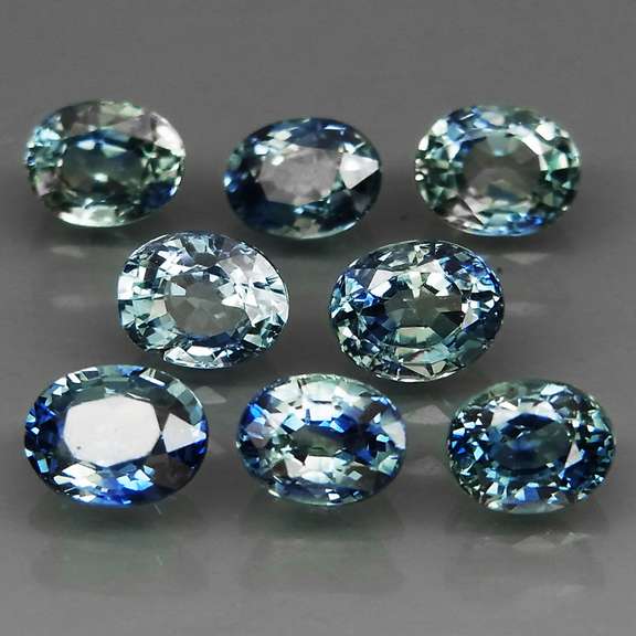Heated only! 3.14ct blue green sapphire set