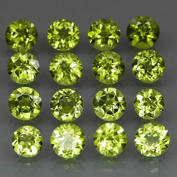 High grade 8.76ct untreated apple green Peridot set