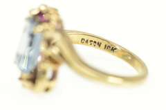 10K Yellow Gold Emerald Cut Blue Topaz Synthetic Ruby Bypass Ring