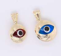 Lot of 2 Devil Eye Yellow Gold Pendants
