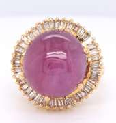 Opulent 14kt YG Cabochon Ruby with Wavy Baguette Halo Ring