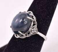 Sensational 11.11CTS Cabochon-Cut Star Sapphire & 0.08CTW Diamond Ring in Sterling Silver